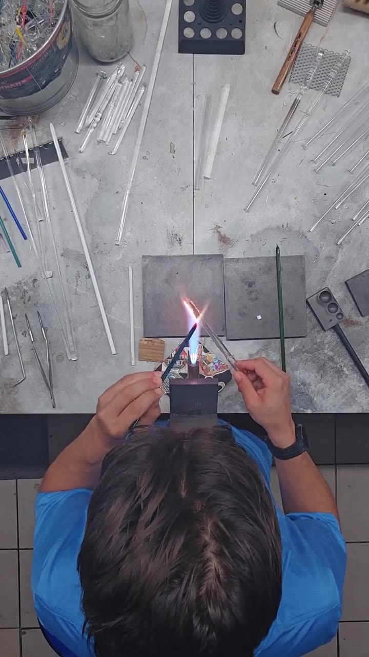 Glass marble glowing at the torch