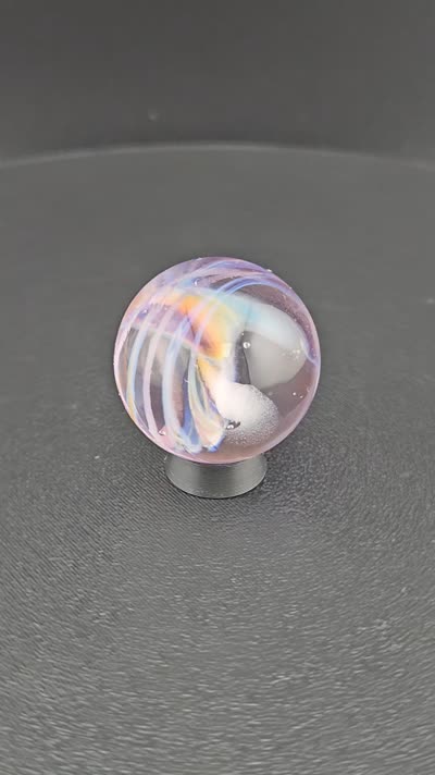Orange spiral glass marble K9