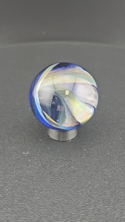 Blue vortex glass marble K3