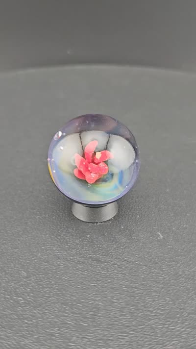 Red vortex glass marble K5